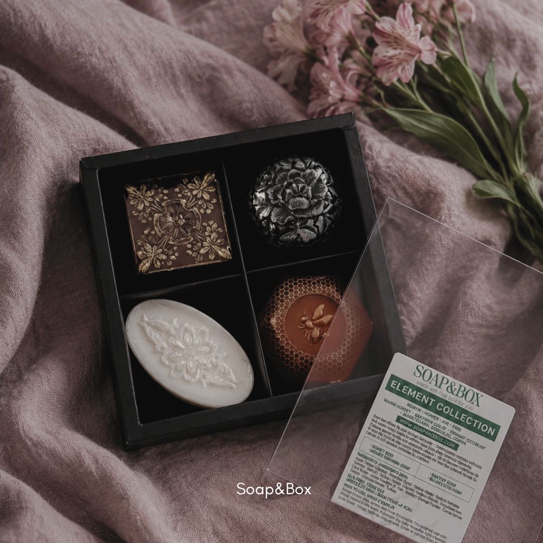 Artisan handmade soaps styled on soft fabric background in neutral tones
