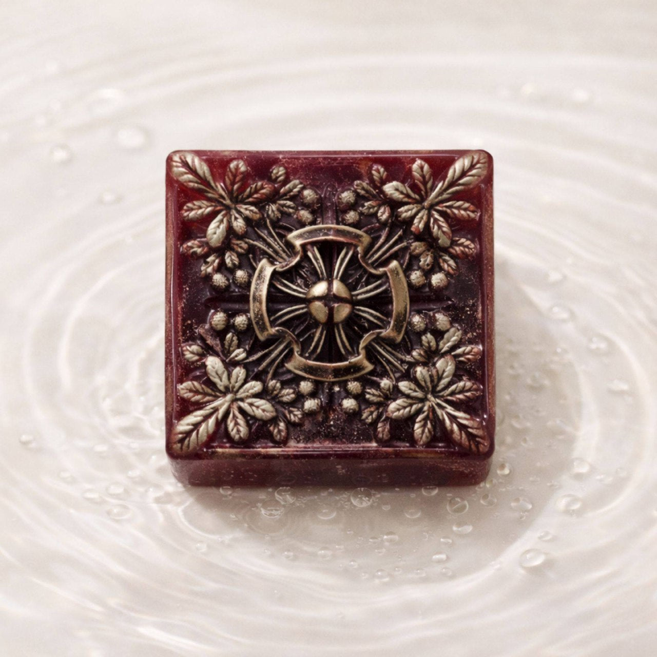 Golden Saffron handmade soap with saffron, shea butter and glycerin on a light background