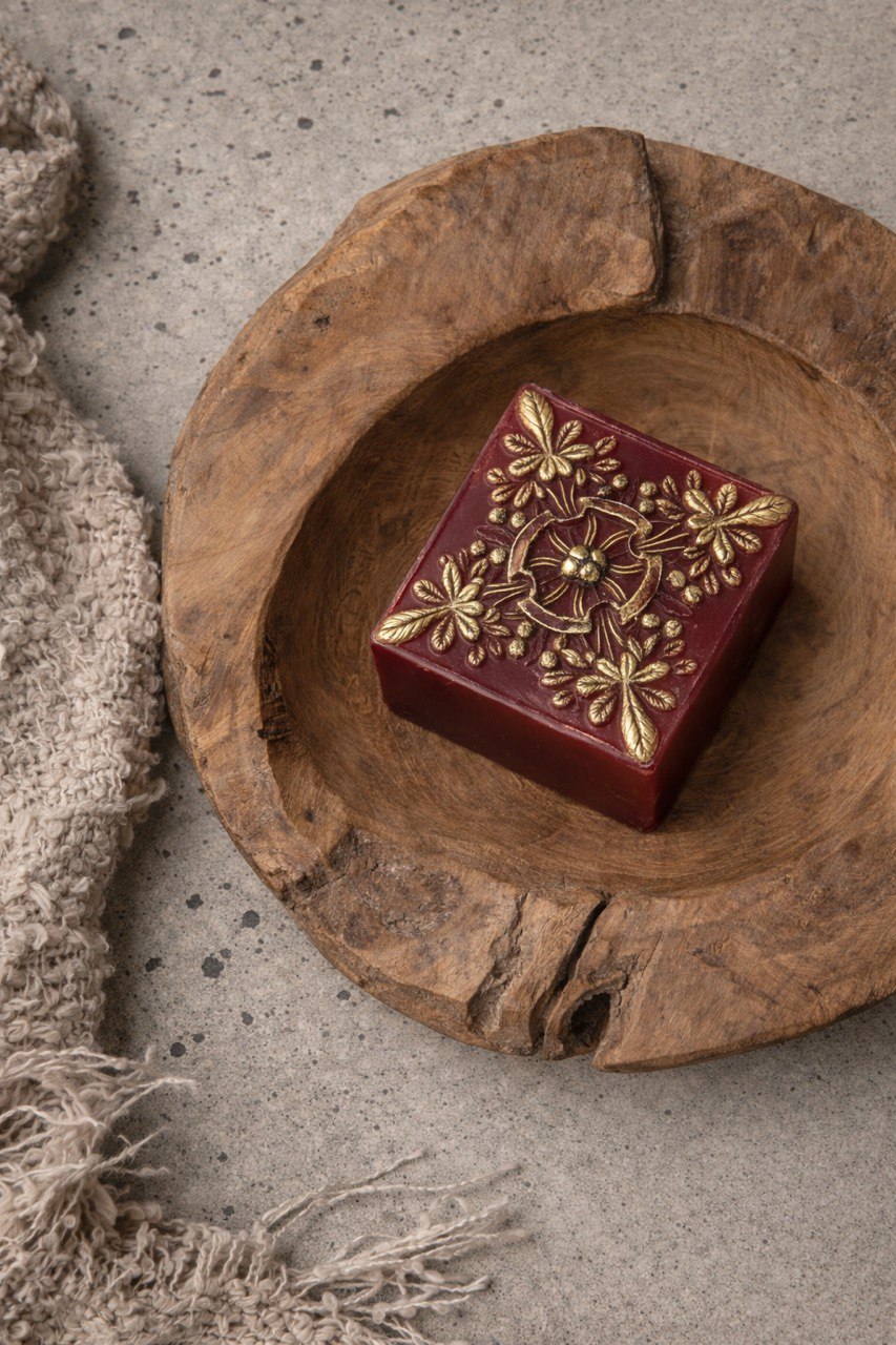Golden Saffron handmade soap with saffron, shea butter and glycerin on a light background
