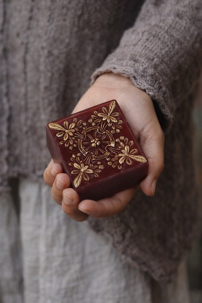 Golden Saffron handmade soap with saffron, shea butter and glycerin on a light background
