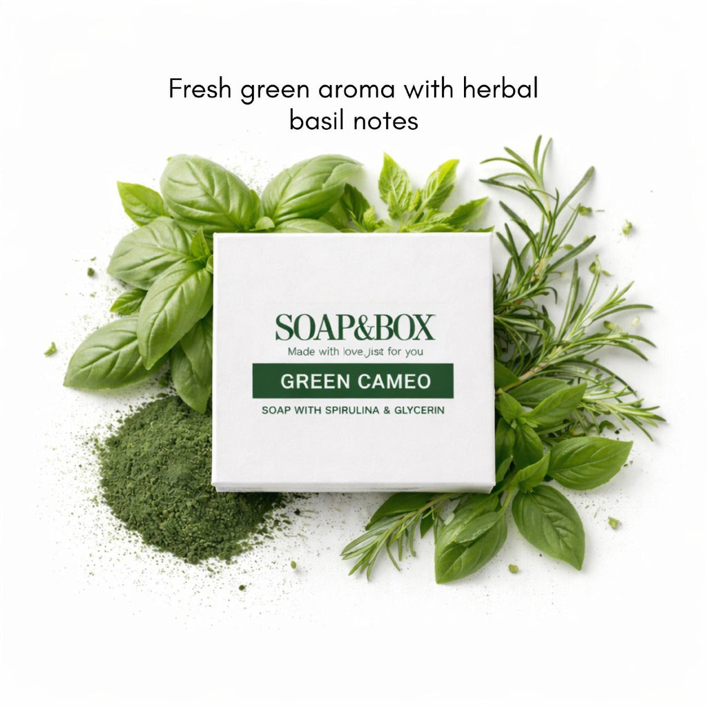 Green soap with decorative design on a black floral arrangement in a bathroom setting.